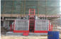 Twin Cage Red Passenger Hoist Elevator 2000kg SC200 / 200 For Construction